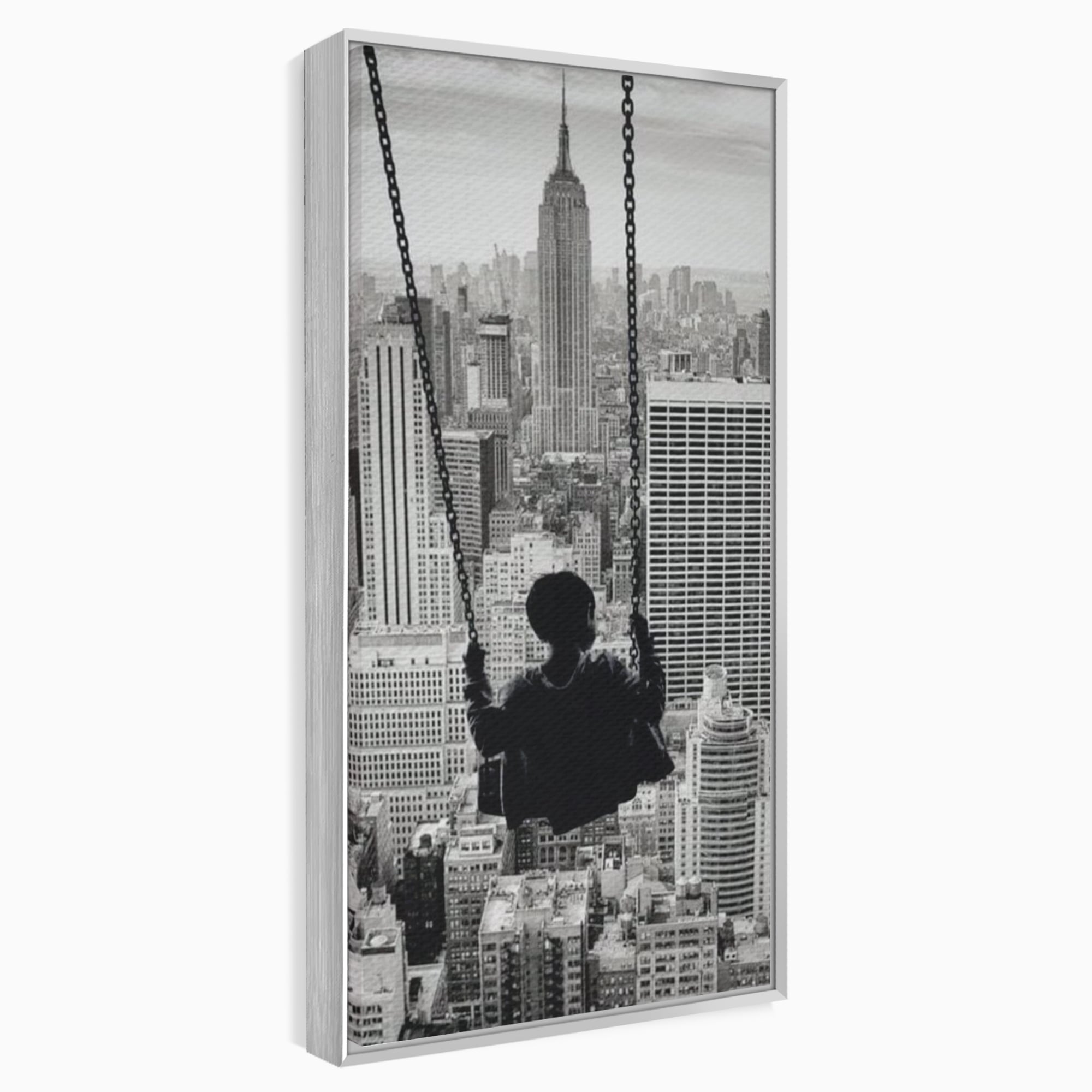 Tablou canvas cu tablou canvas cu copil in leagan deasupra orasului, in rama de aluminiu argintiu